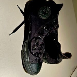 Pair of converse black womens size 9 sneakers gently used